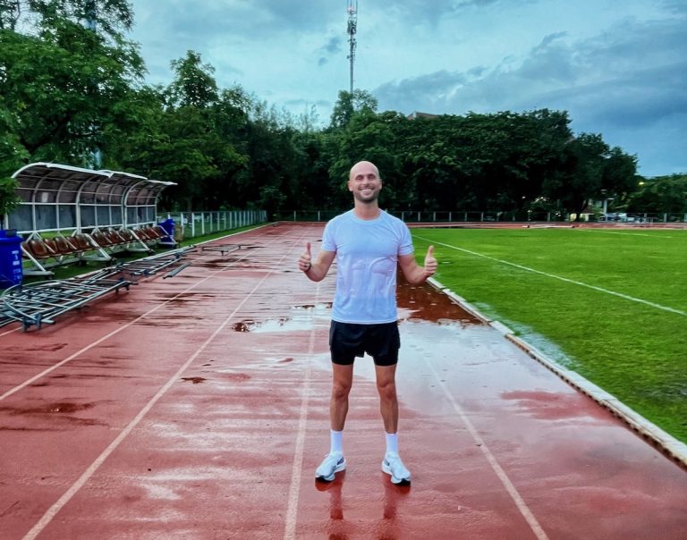Runner on track after training for a faster 5K time
